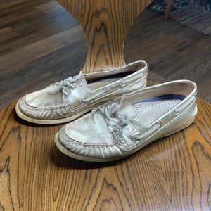 Sperry’s gold shoes